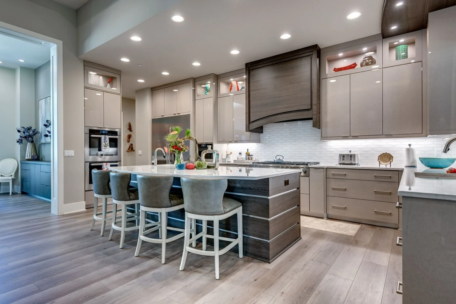 Custom light-toned kitchen with island, built by Pro-Tech Woodworking